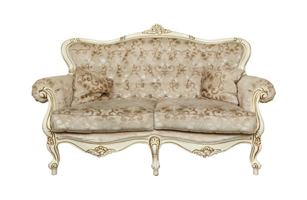 White tufted retro Chesterfield sofa isolated