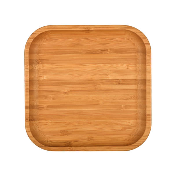 istock Brown wooden tray plate isolated on white 1267691265
