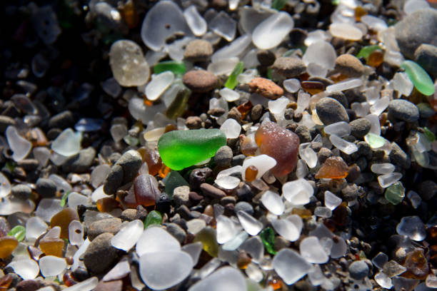 istock closeup of glass on a beach 1267693314