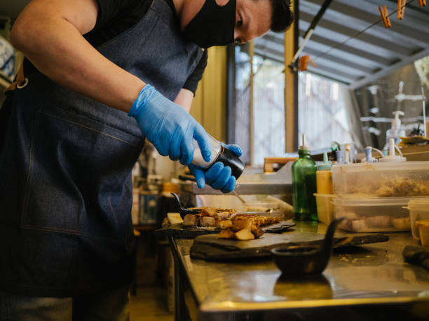 istock Asian business owner reopening a restaurant. 1267693357