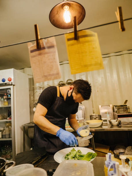 istock Asian business owner reopening a restaurant. 1267693361