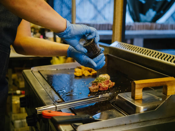 istock Asian business owner reopening a restaurant. 1267693416