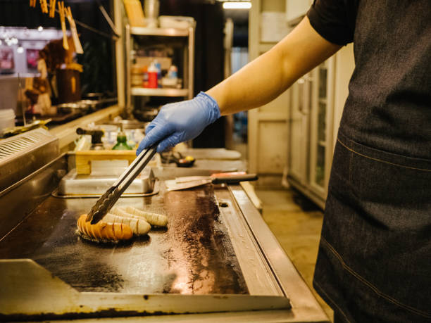 istock Asian business owner reopening a restaurant. 1267693446