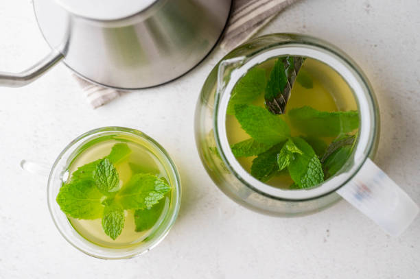 istock green hot mint tea in glass cup 1267693470