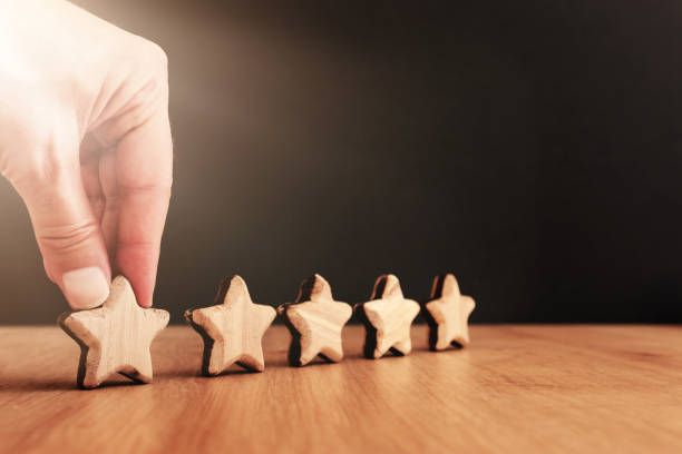 istock concept image of setting a five star goal. increase rating or ranking, evaluation and classification idea 1267705854