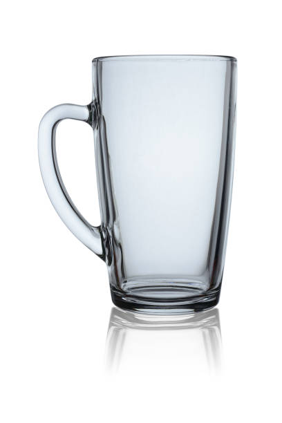 istock Empty glass Cup with a handle, close-up. Isolated on a white background with reflection 1267706361