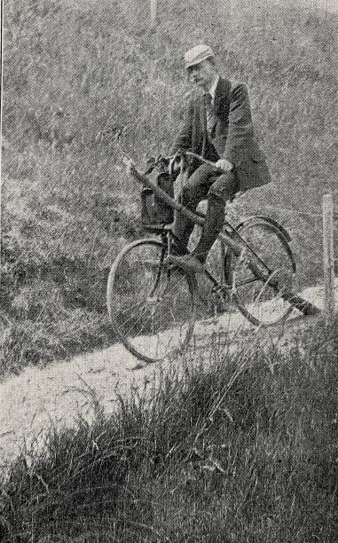 istock Bicyclist rolling down the hill, front wheel drive, evenly low wheels 1267707446