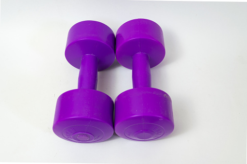 Dumbbells of 2 kg to do strength exercises.