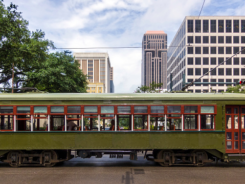 Trolley car crossing a street in the New Orleans downtown office district not far from the French Quarter