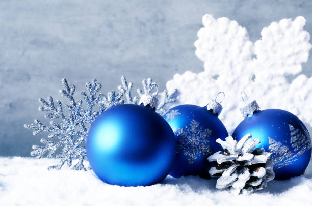 istock Christmas balls and snowflake on winter background. 1267711281