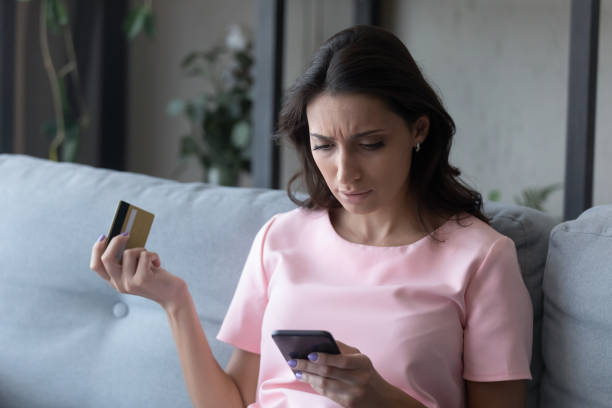istock Unhappy ethnic woman have problems paying online 1267716558