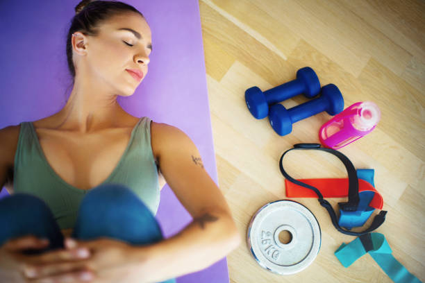 istock Young woman taking a break at the gym. 1267717626
