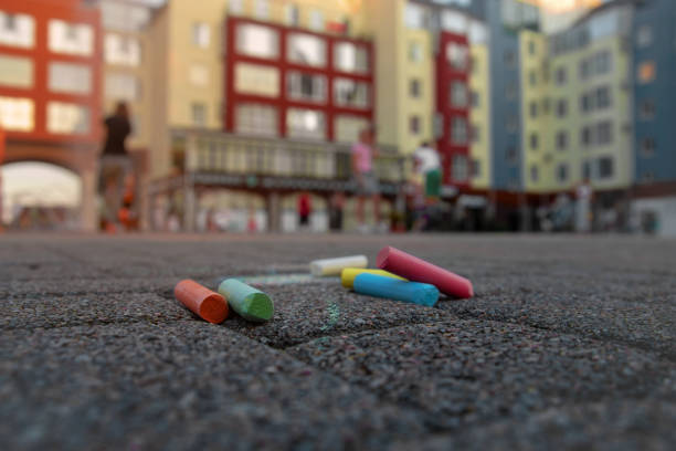 istock colored chalk for drawing on street close up 1267717738