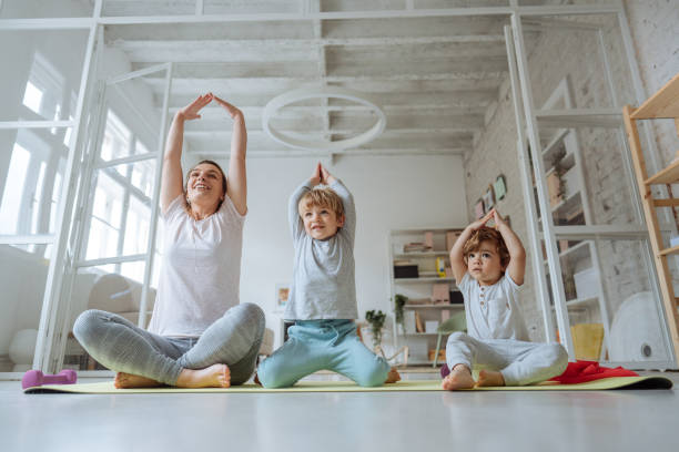 istock Doing yoga with our mom 1267718962