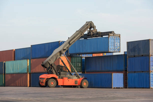 istock The forklift is lifting the container in the container yard. 1267723552