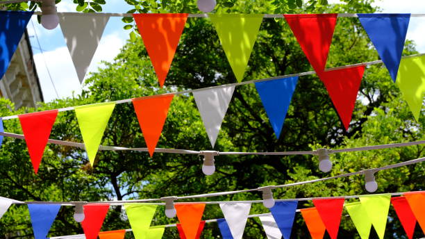 istock Festive multi-colored flags on the city street 1267724017