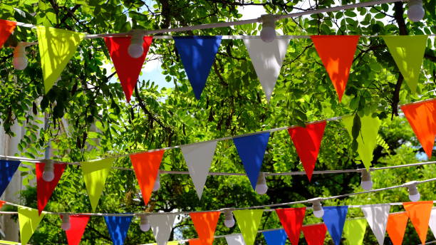 istock Festive multi-colored flags on the city street 1267724029