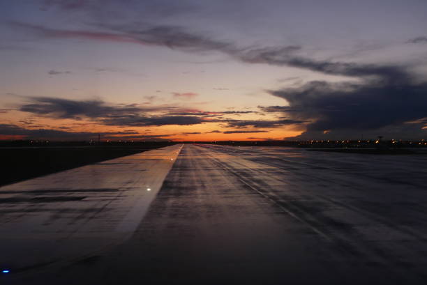 Landing runway at the sunrise stock photo