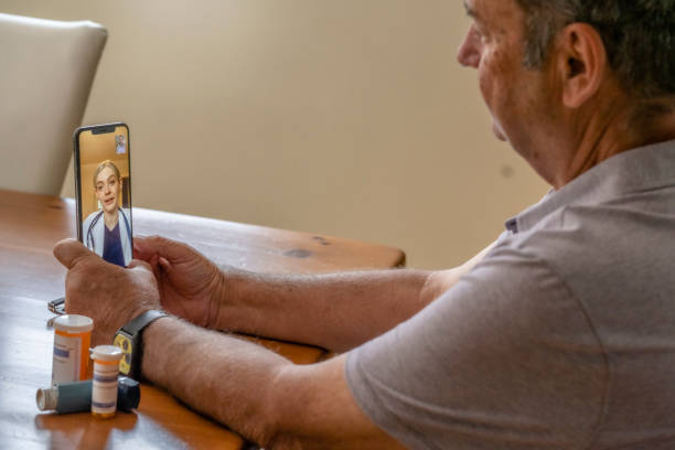 istock Telemedicine video call between doctor and patient 1267730945