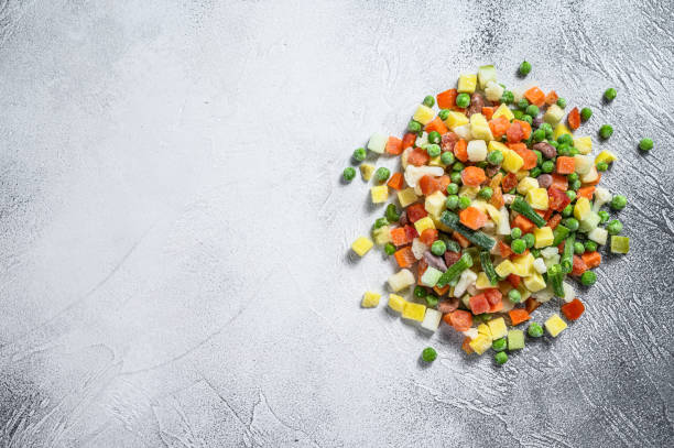 frozen raw vegetables. vegetarianism. white background. top view - edible mushroom frozen variation ice imagens e fotografias de stock