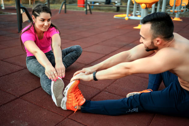 istock Young couple exercising outdoors 1267737333