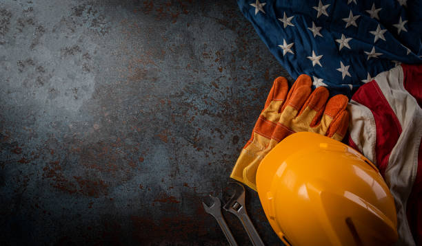 istock Happy Labor day concept. American flag with different construction tools on dark stone background, with copy space for text. 1267740837