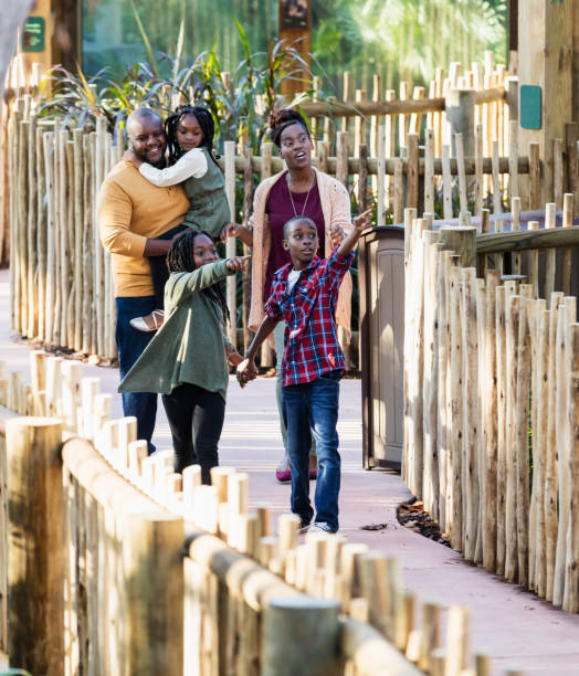 istock African-American family visiting the zoo 1267746549