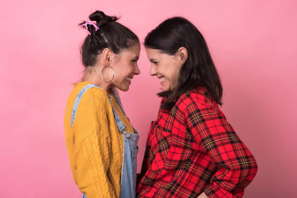 istock Beautiful twin sisters posing 1267747887