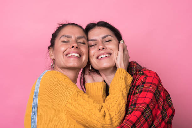 istock Portrait of beautiful twins 1267747892