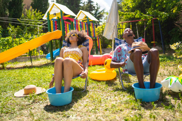 istock Young couple relaxing in the backyard during lockdown 1267748144