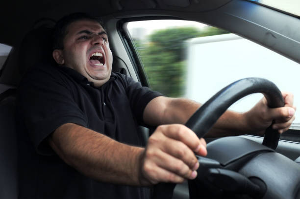 istock Young angry man driving his vehicle 1267756298