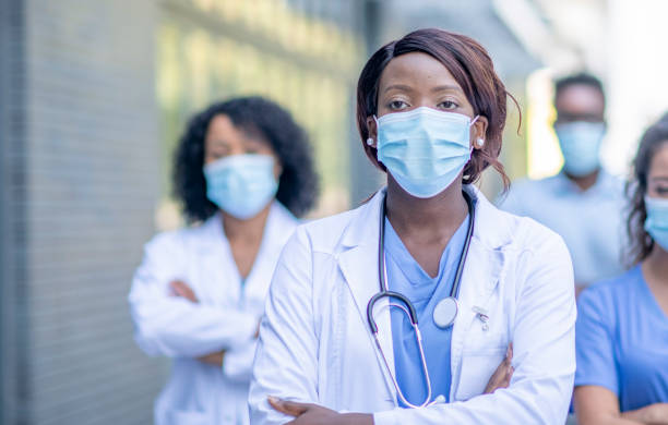 istock Group of doctors outside 1267759576