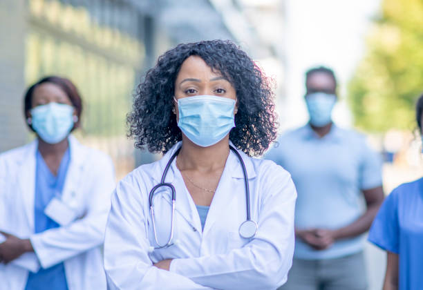 istock Group of doctors outside 1267759579