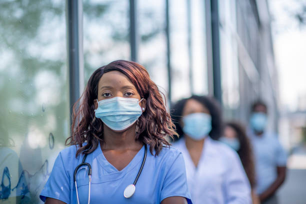 istock Group of doctors outside 1267759603