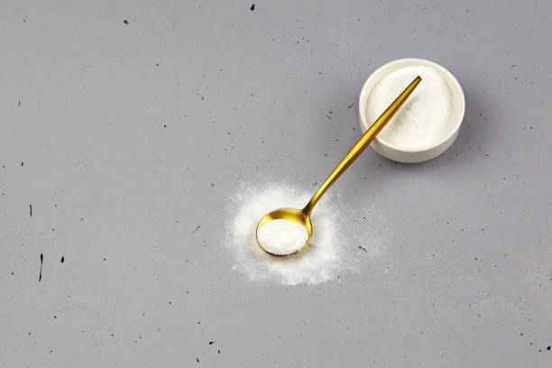 istock Collagen powder in jar, in spoon 1267771489