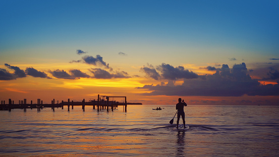 Paddle boarding in the Florida Keys under a beautiful sunset