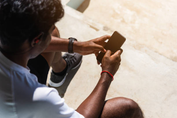 istock sport runner black man wear modern time smart watch 1267784496