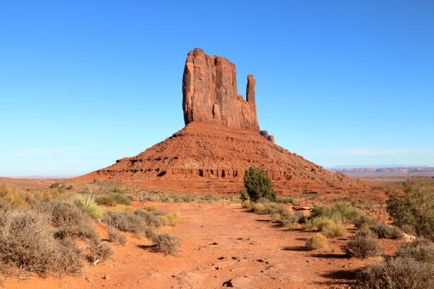 West Mitten Butte, Monument Valley, Arizona West Mitten Butte seen from Wildcat trail on the valley floor, Monument Valley, Arizona west mitten stock pictures, royalty-free photos & images