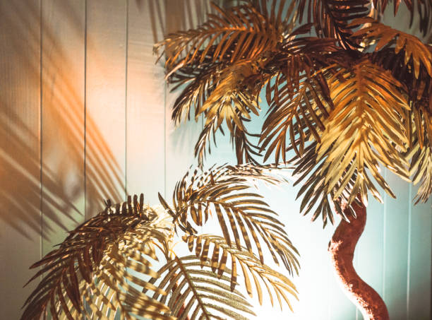 istock palm trees ,Summer composition. Tropical palm leaf on pastel blue background. Summer concept. Flat lay, top view, copy space 1267797077