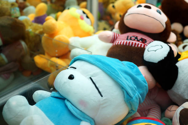 istock Various Cute stuffed animals in claw crane machine 1267809310
