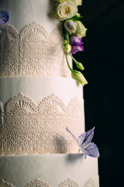 istock Cake is decorated with flowers on a dark background. 1267816953