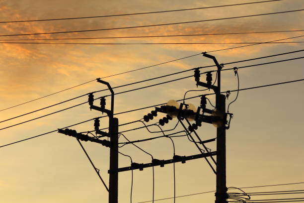 istock High voltage pylon in the field 1267821179