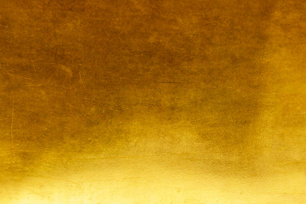 istock Gold abstract background or texture distress  scratch and gradients shadow 1267828846