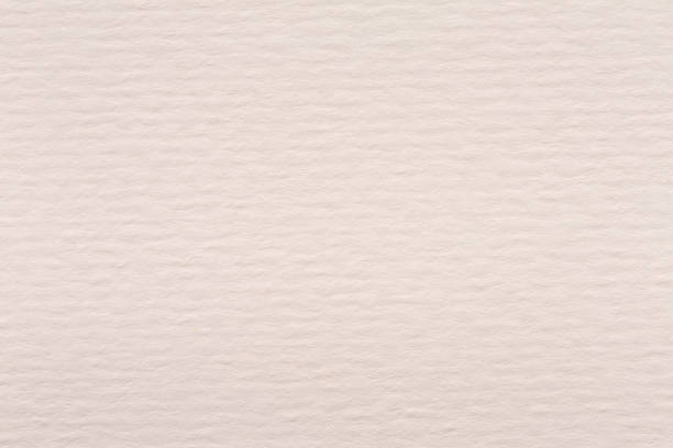 istock Old vintage beige paper texture on macro. 1267859429