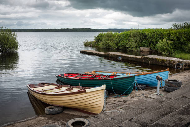 Wooden rowboats in a small marina on lake Melvin in County Leitrim Ireland