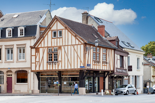 Reims, France - June 09 2020: Half timbered townhouses in the old town of Reims few meters away fromt the Basilica of Saint-Remi.