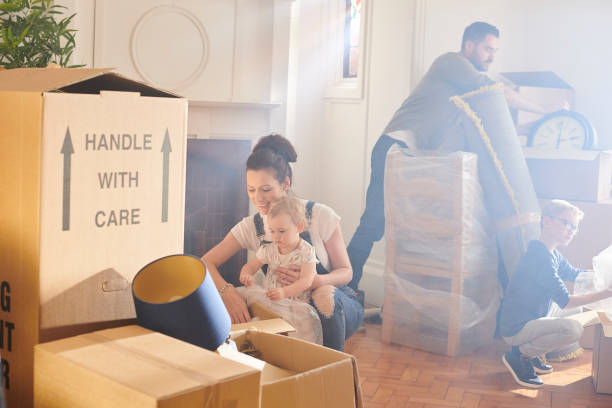 istock unpacking at the new house 1267905867