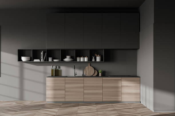 istock Grey kitchen with wooden cabinets 1267933883