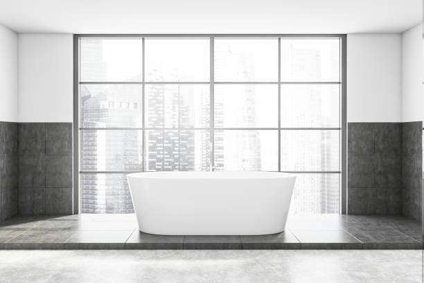 istock Panoramic white and grey bathroom with tub 1267934742