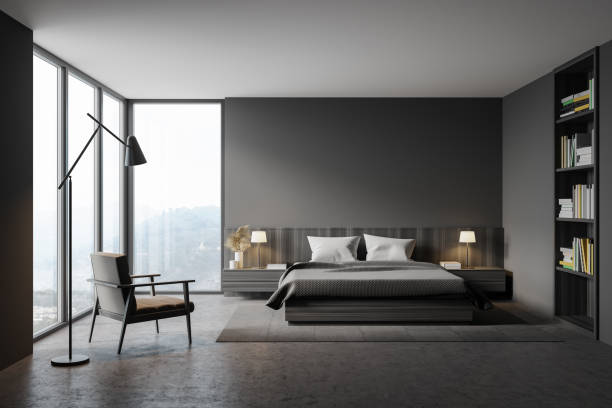 istock Grey master bedroom interior with armchair 1267935458